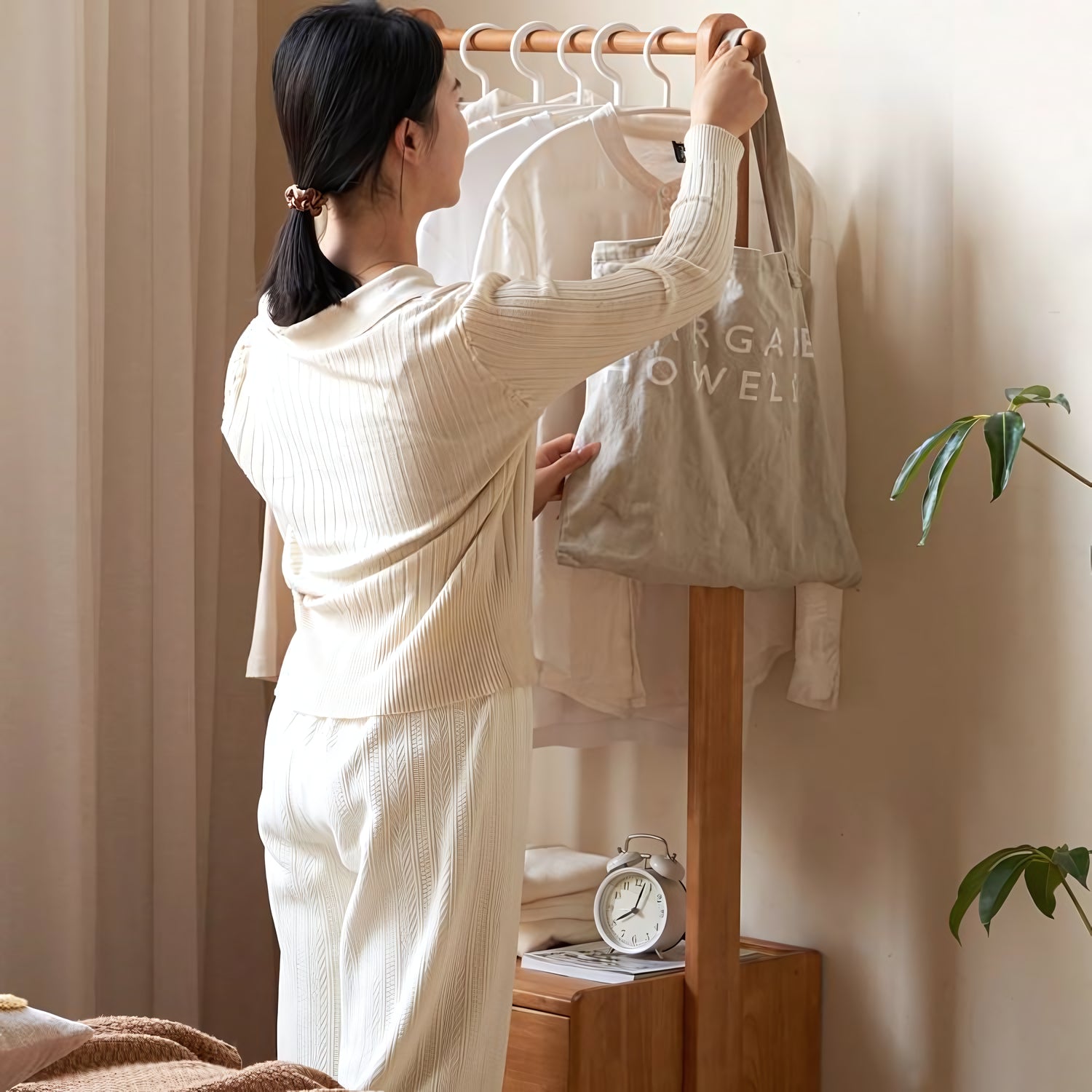 Erto Clothes rack with storage cabinet
