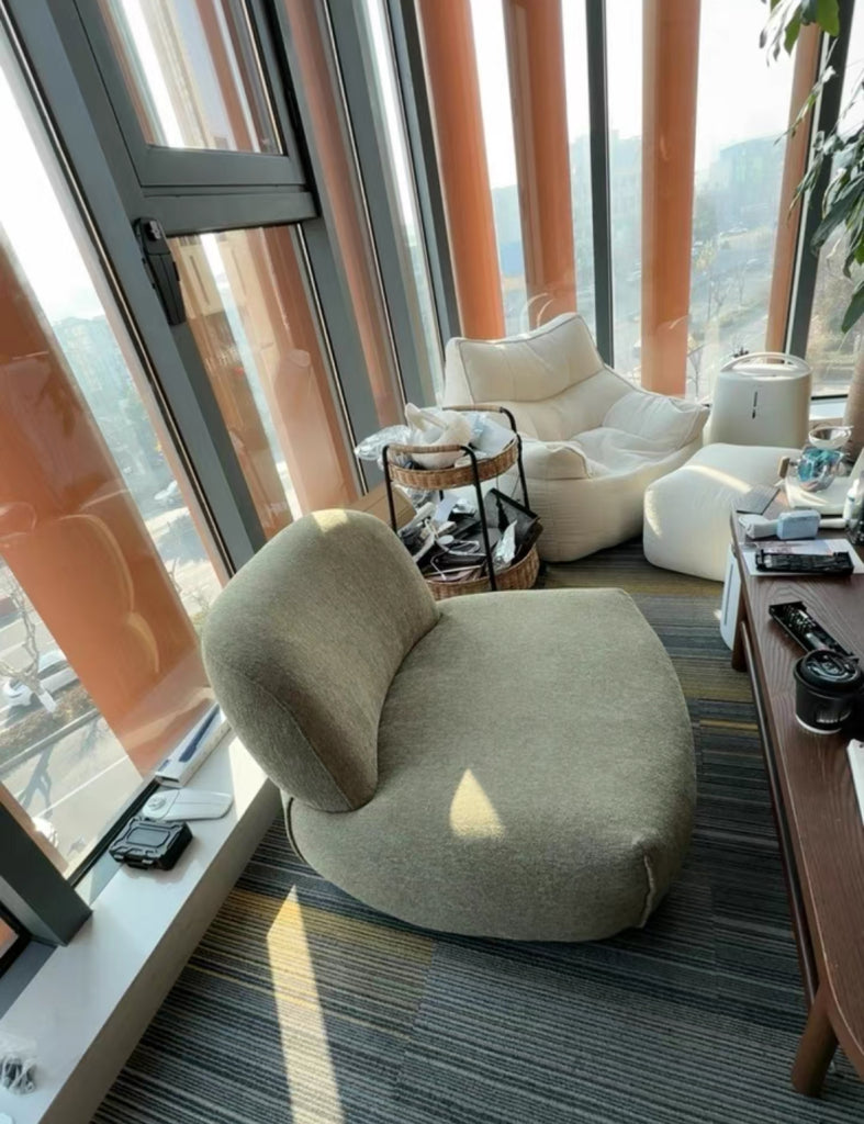 Olria 360° rotatable fabric single sofa