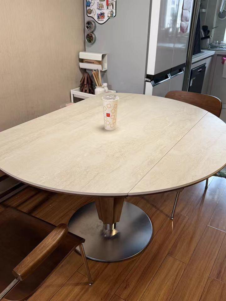 Patima Round-to-rectangular sliding extension dining table