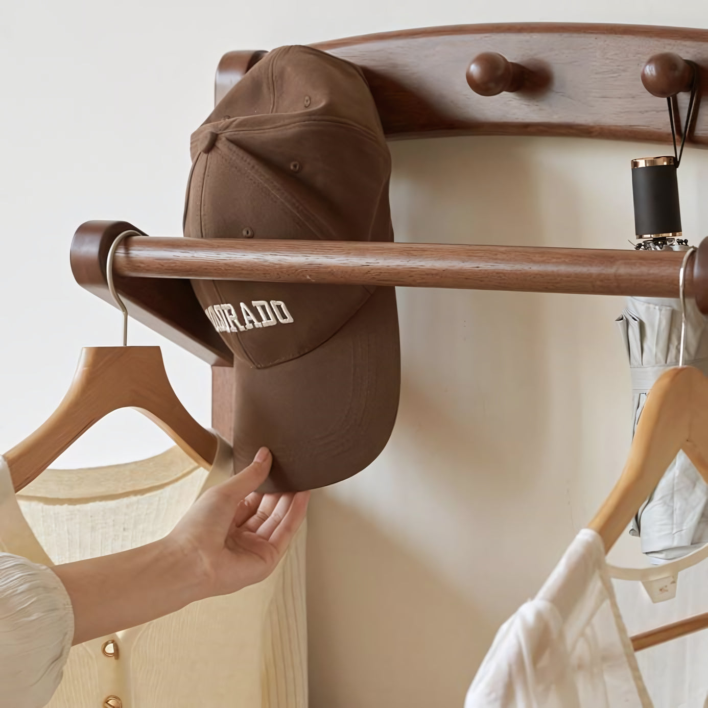 Orsova Clothes rack with storage cabinet